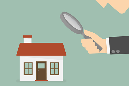 Clip art- home with magnifying glass to show the home is being inspected.