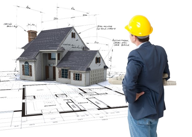 house with design specs and man in hard hat