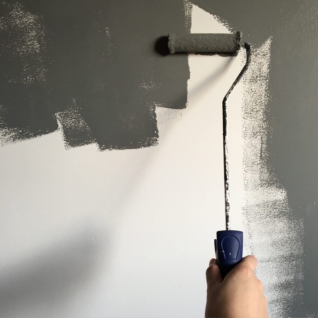 painting a room with a roller